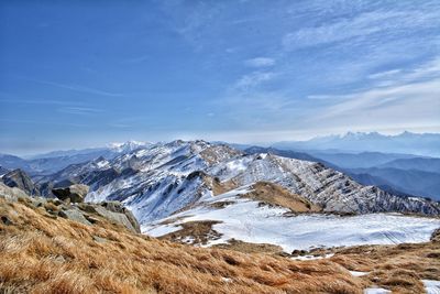 Scenic view of mountains against sky during winter