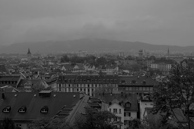 High angle view of townscape against sky in city