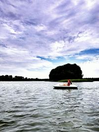 Scenic view of sea against cloudy sky