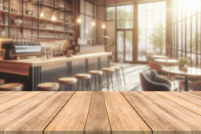 Close-up of wooden table at restaurant