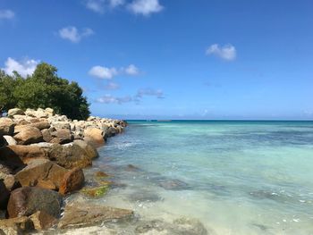 Scenic view of sea against blue sky