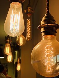 Close-up of illuminated light bulb