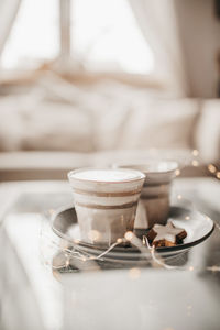 Close-up of coffee cup on table