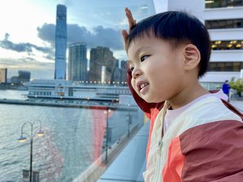 Portrait of cute asian boy looking away