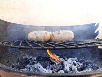 Close-up of meat on barbecue grill