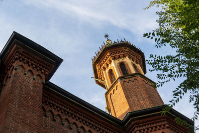 Low angle view of ornate building against sky