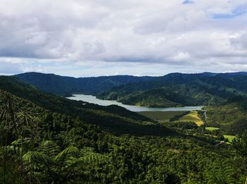 Scenic view of agricultural landscape against sky