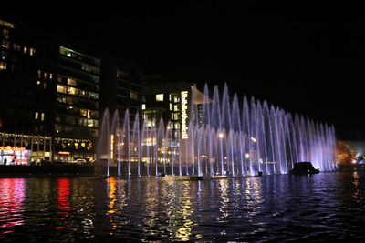 Illuminated buildings at night