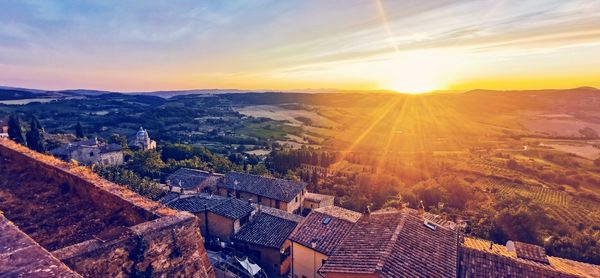 High angle view of townscape against sky during sunset