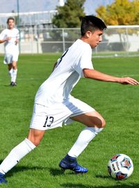 Man playing soccer on field