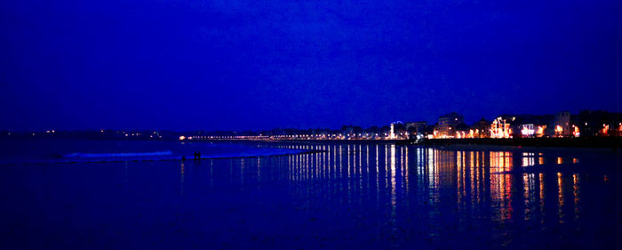 View of illuminated buildings at night