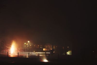 View of illuminated buildings at night