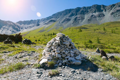 View of a field with mountain range in the background