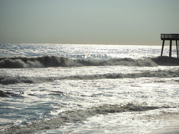 Scenic view of sea against clear sky