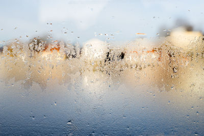 Full frame shot of wet glass window