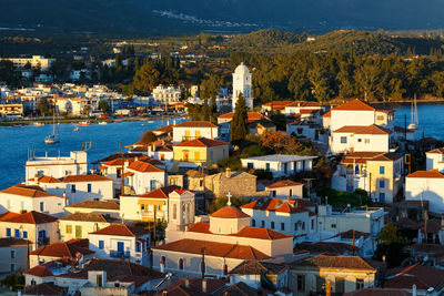 High angle view of townscape by sea