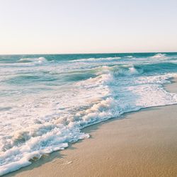 Scenic view of sea against clear sky