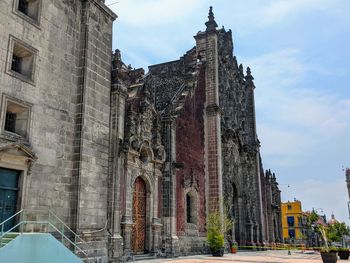 Low angle view of historic building against sky