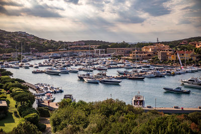 Boats moored at harbor