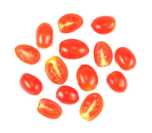 Close-up of tomatoes against white background