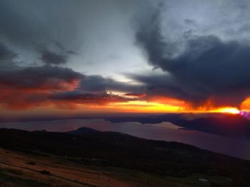 Scenic view of dramatic sky during sunset