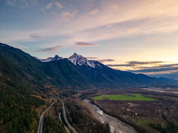 Scenic view of mountains against sky during sunset