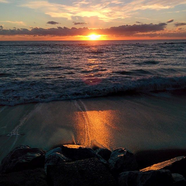 sea, sunset, water, horizon over water, beach, sun, scenics, tranquil scene, sky, beauty in nature, tranquility, shore, reflection, idyllic, nature, orange color, cloud - sky, sunlight, wave, sunbeam