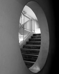 Directly below shot of spiral staircase of building