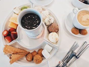 High angle view of breakfast served on table