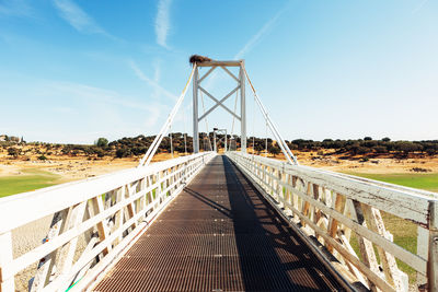 View of suspension bridge against sky