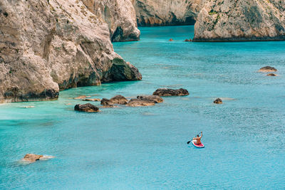 Person on paddleboard in the sea