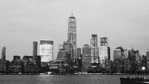 Modern buildings in city against sky