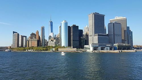 Low angle view of skyscrapers against clear sky