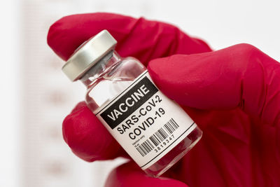 Vaccination with serum and syringe against covid-19 virus