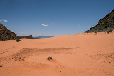 Scenic view of desert against sky