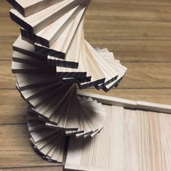 High angle view of book on wooden floor