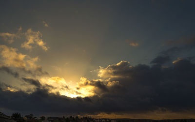 Scenic view of dramatic sky during sunset