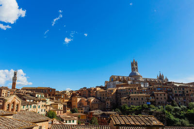 Townscape against blue sky