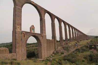 Low angle view of old bridge