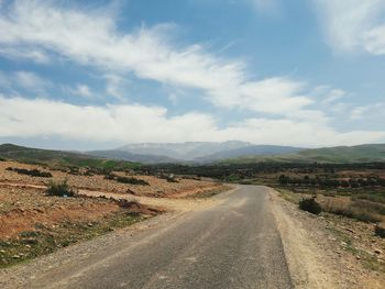 Country road passing through landscape