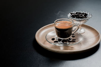 Close-up of coffee cup on table