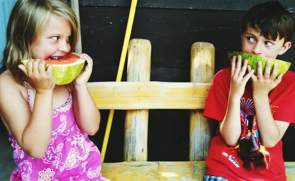 PORTRAIT OF GIRL EATING FOOD