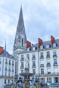 Main square, fountain and church. nantes, france