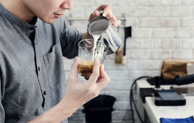 Man preparing coffee