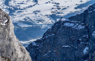 Scenic view of snowcapped mountains during winter