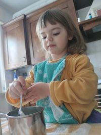 Girl looking at camera at home