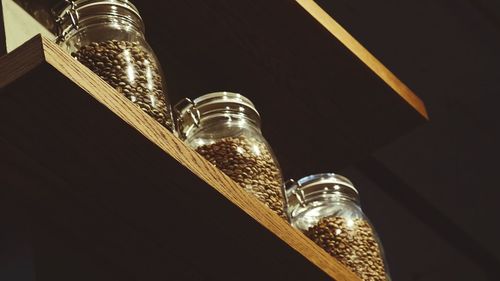 Close-up of illuminated lamp on table