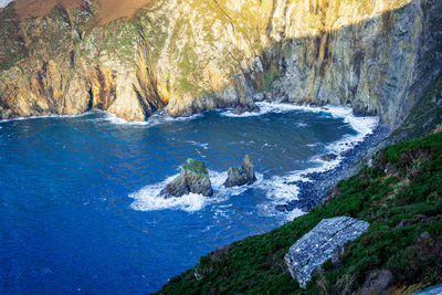 Scenic view of rocks in sea