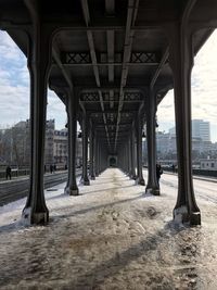 View of bridge in city during winter