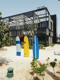 Built structure on beach against clear blue sky